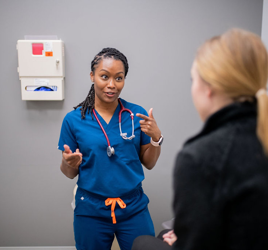 Life Coast Health physician with a patient